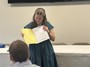 Emily Vaughan discussing the book that she put together.